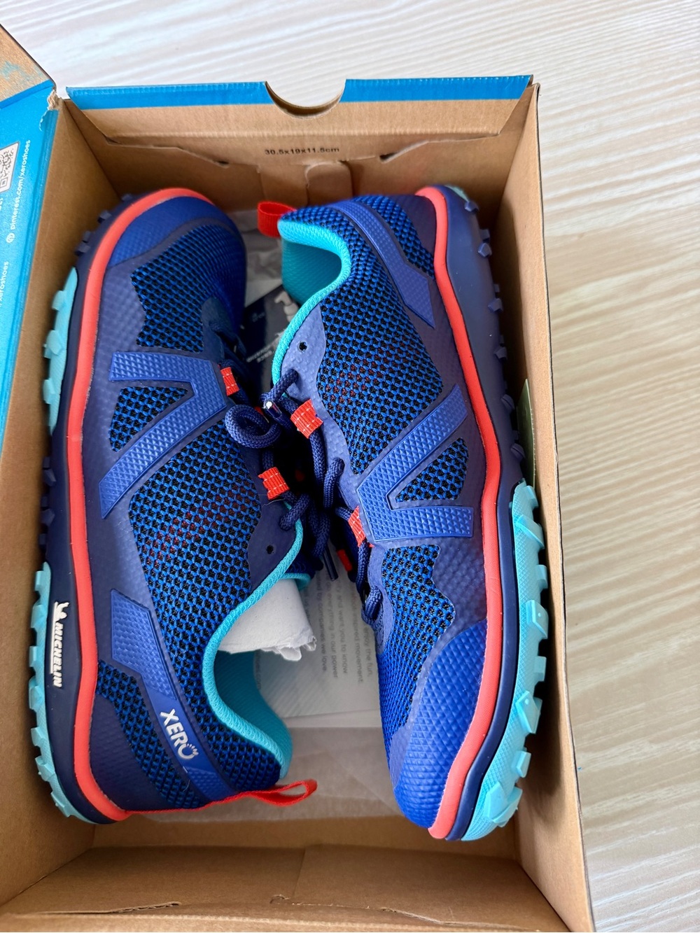 XERO Scrambler Low -  blue and orange. Women’s 9